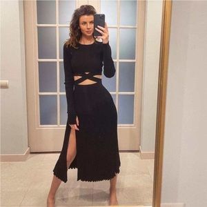 72 Glamorous Black Wrap Long Sleeve Crop Top & Pleated High Rise Skirt Set